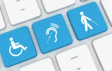 Digital accessibility icons on keyboard