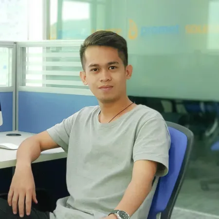 Jhon Robert at a desk