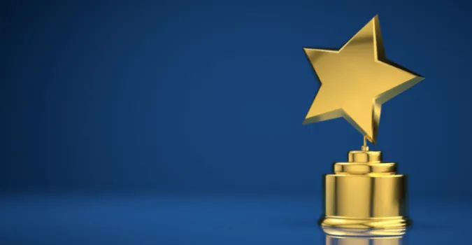 Star trophy against blue background