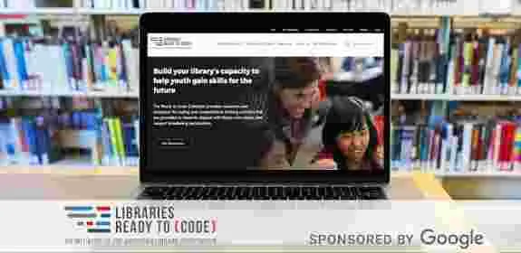 The ALA Ready to Code site on a computer screen with library books in the background
