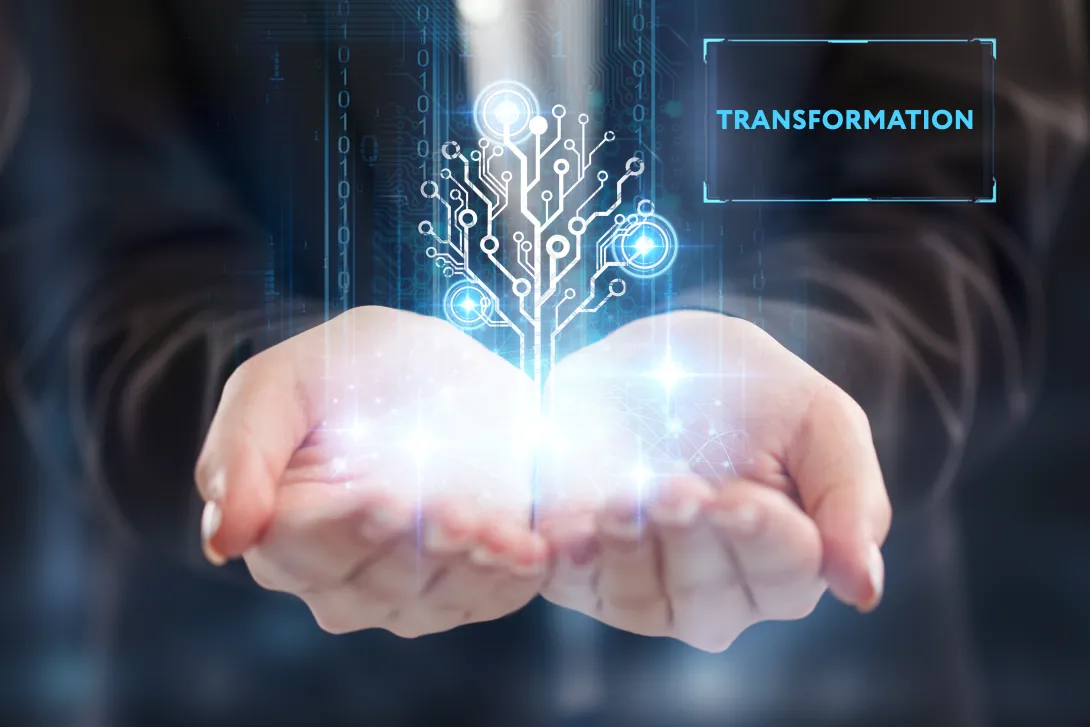 two cupped hands holding an image that conveys digital transformation