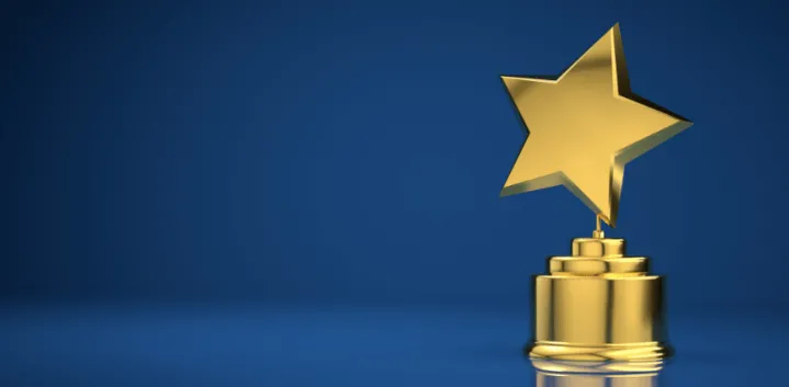 Star trophy against blue background