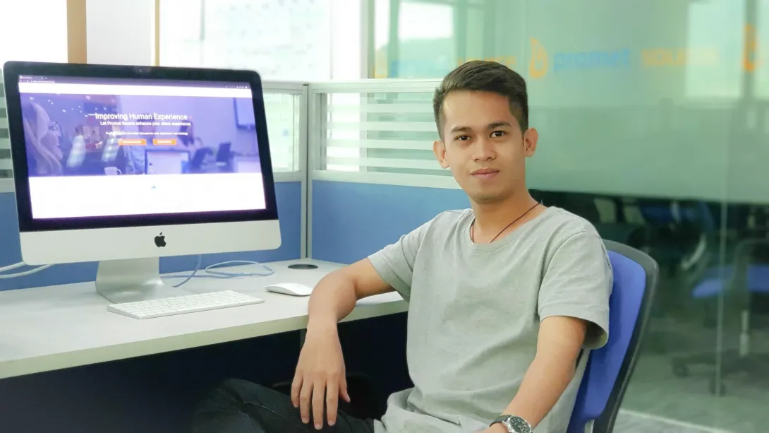 Jhon Robert at a desk